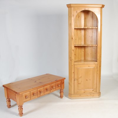 Lot 118 - A pine corner cupboard, fitted with three open...