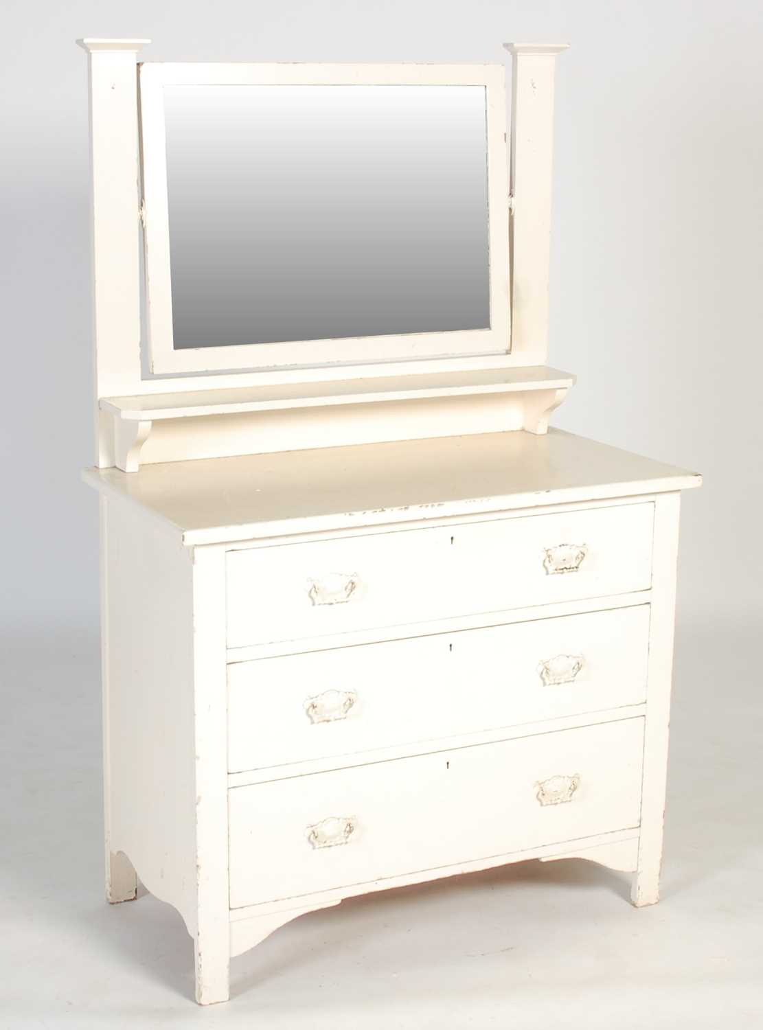 Lot 74 - An early 20th century later white painted pine...