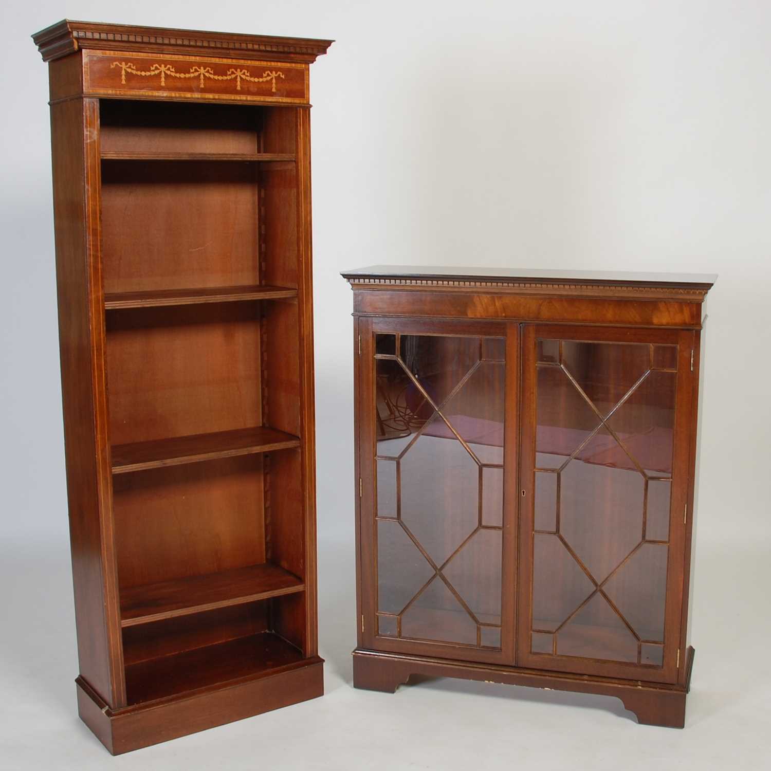 Lot 38 - A mahogany display cabinet, fitted with two...