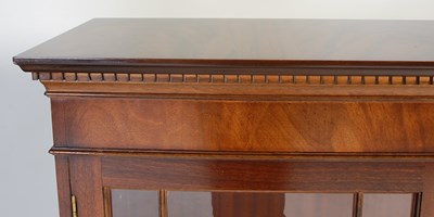 Lot 38 - A mahogany display cabinet, fitted with two...