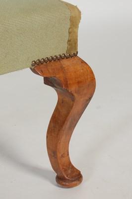 Lot 20 - An early 20th century green ground needlework...