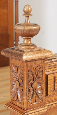 Lot 60 - An early 20th century oak double bed, the...