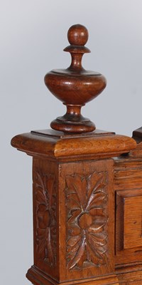 Lot 60 - An early 20th century oak double bed, the...