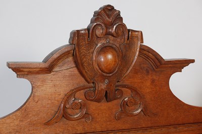 Lot 60 - An early 20th century oak double bed, the...