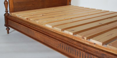 Lot 60 - An early 20th century oak double bed, the...