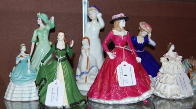Lot 1 - A group of seven assorted ceramic lady figures...