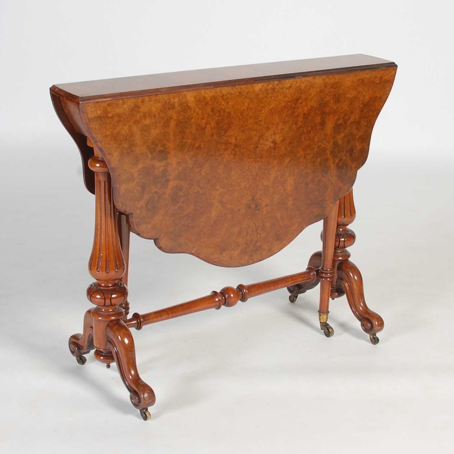 Lot 76 - A 19th century walnut Sutherland table, the...