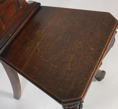 Lot 46 - A Victorian stained oak hall chair, the...