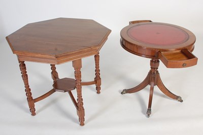 Lot 24 - A reproduction mahogany drum shaped occasional...