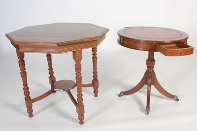 Lot 24 - A reproduction mahogany drum shaped occasional...