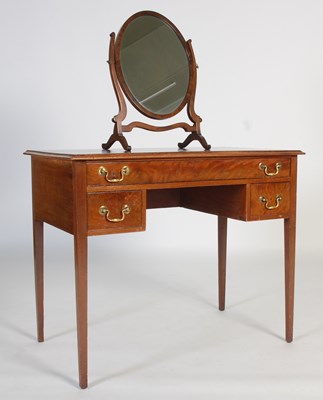 Lot 105 - A mahogany dressing table, the square top...