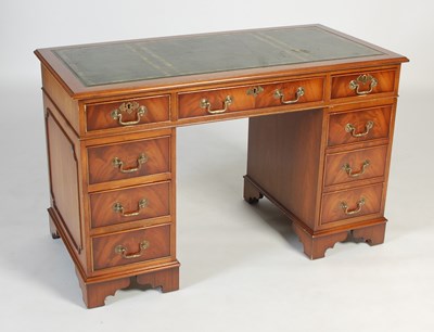 Lot 112 - A reproduction mahogany pedestal desk, the...