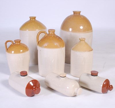 Lot 765 - Five assorted stone ware flagons, to include a...