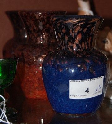 Lot 4 - A pair of Strathearn glass vases mottled red...
