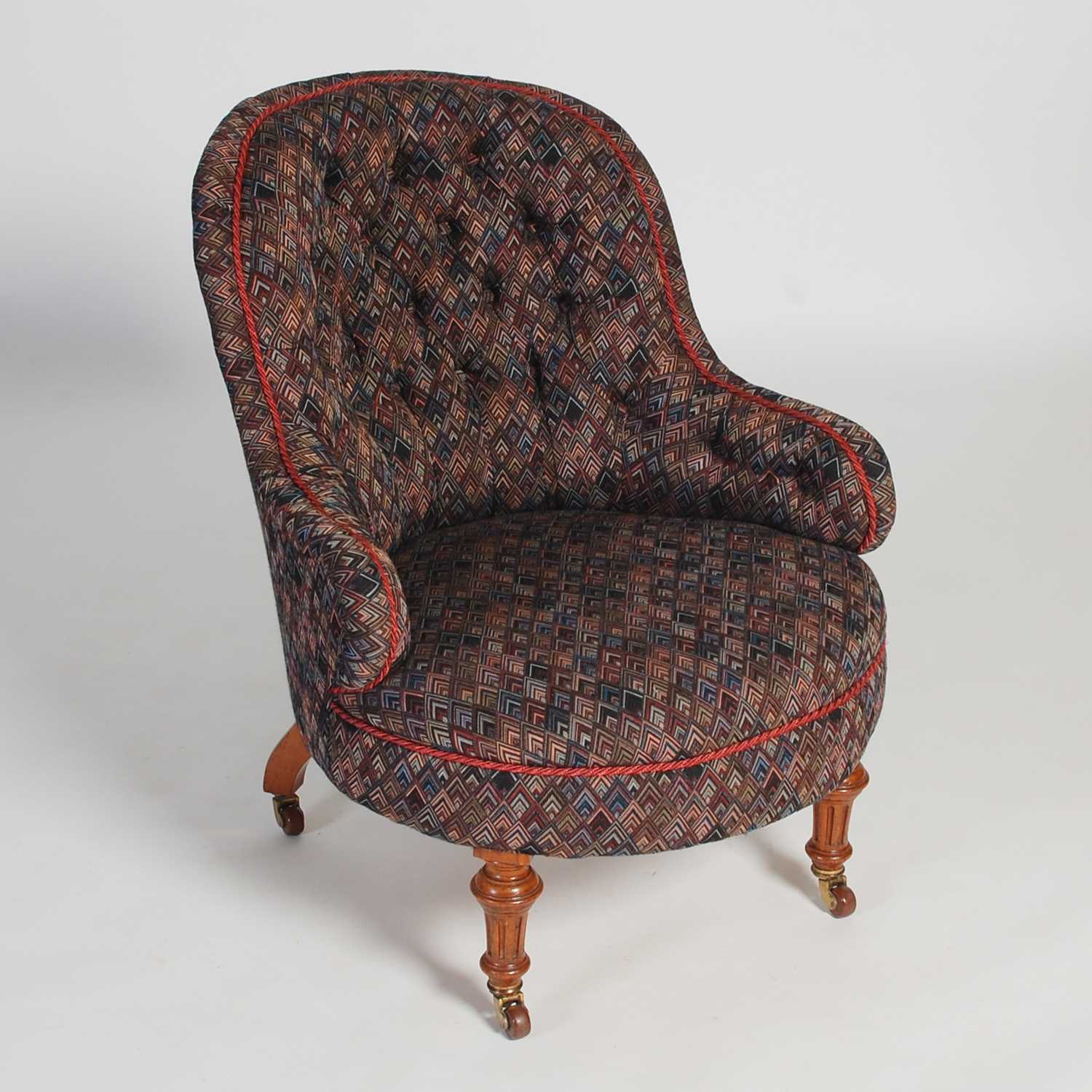 Lot 57 - A Victorian walnut slipper chair, with later...