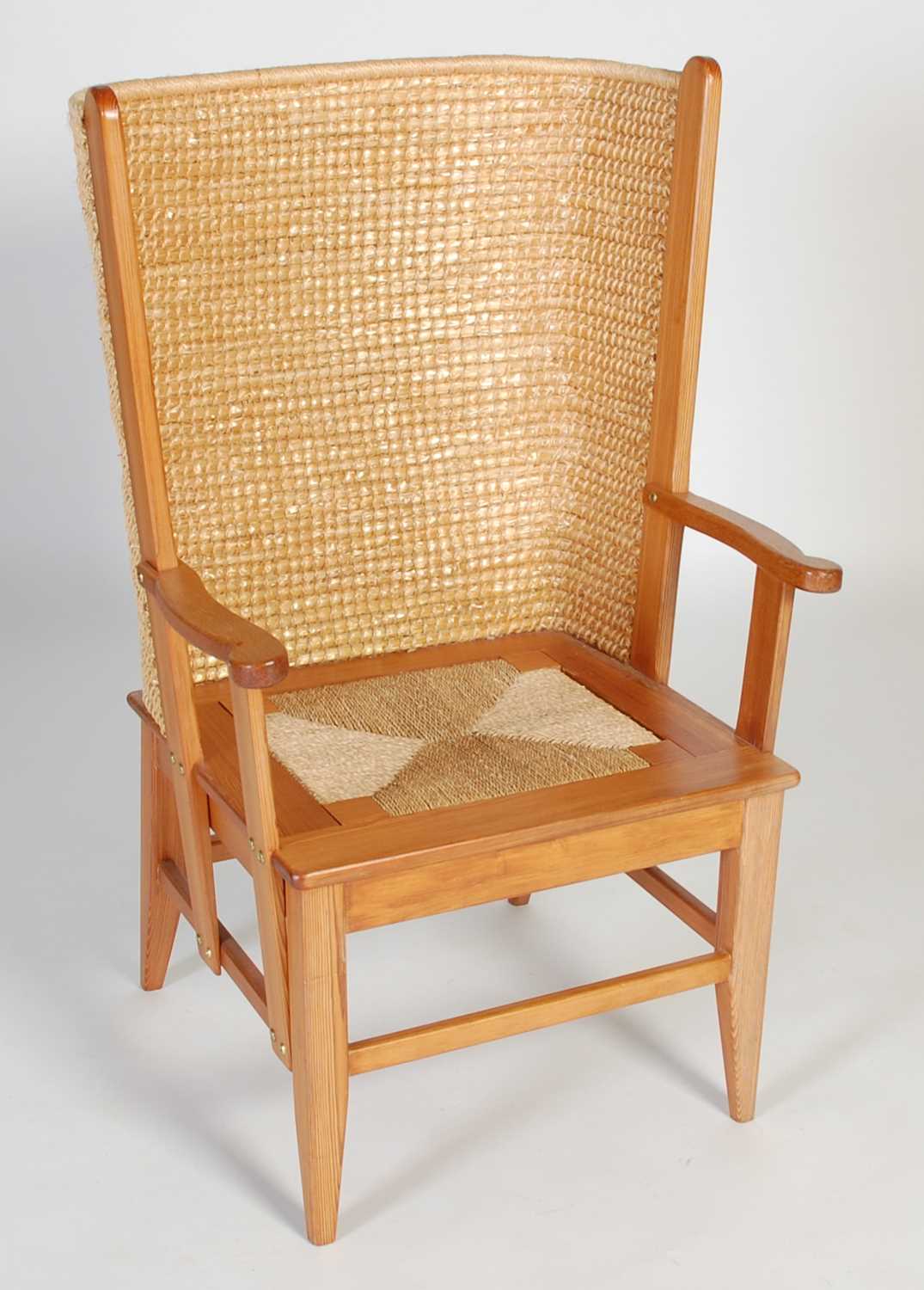 Lot 40 - A pine Orkney chair, with woven back and...