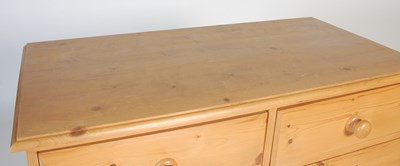 Lot 4 - A pine chest, fitted with two short over four...