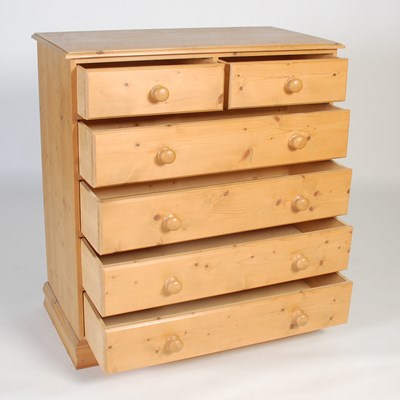 Lot 4 - A pine chest, fitted with two short over four...