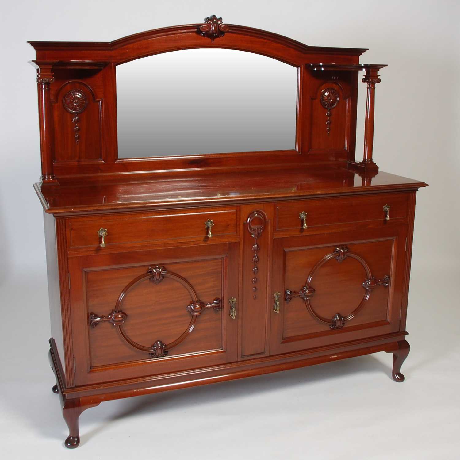 Lot 9 - An early 20th century mahogany mirror back...