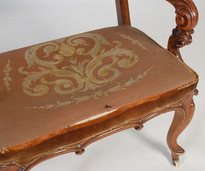 Lot 51 - A Victorian walnut armchair, with needlework...