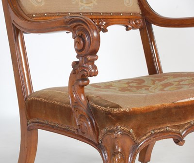 Lot 51 - A Victorian walnut armchair, with needlework...
