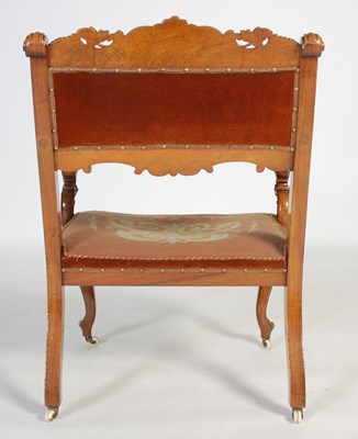 Lot 51 - A Victorian walnut armchair, with needlework...