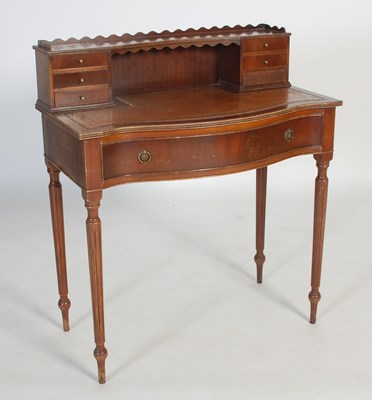Lot 108 - A 20th century mahogany writing desk, the...