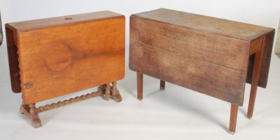 Lot 136 - An oak drop-leaf dining table, 106cm wide x...