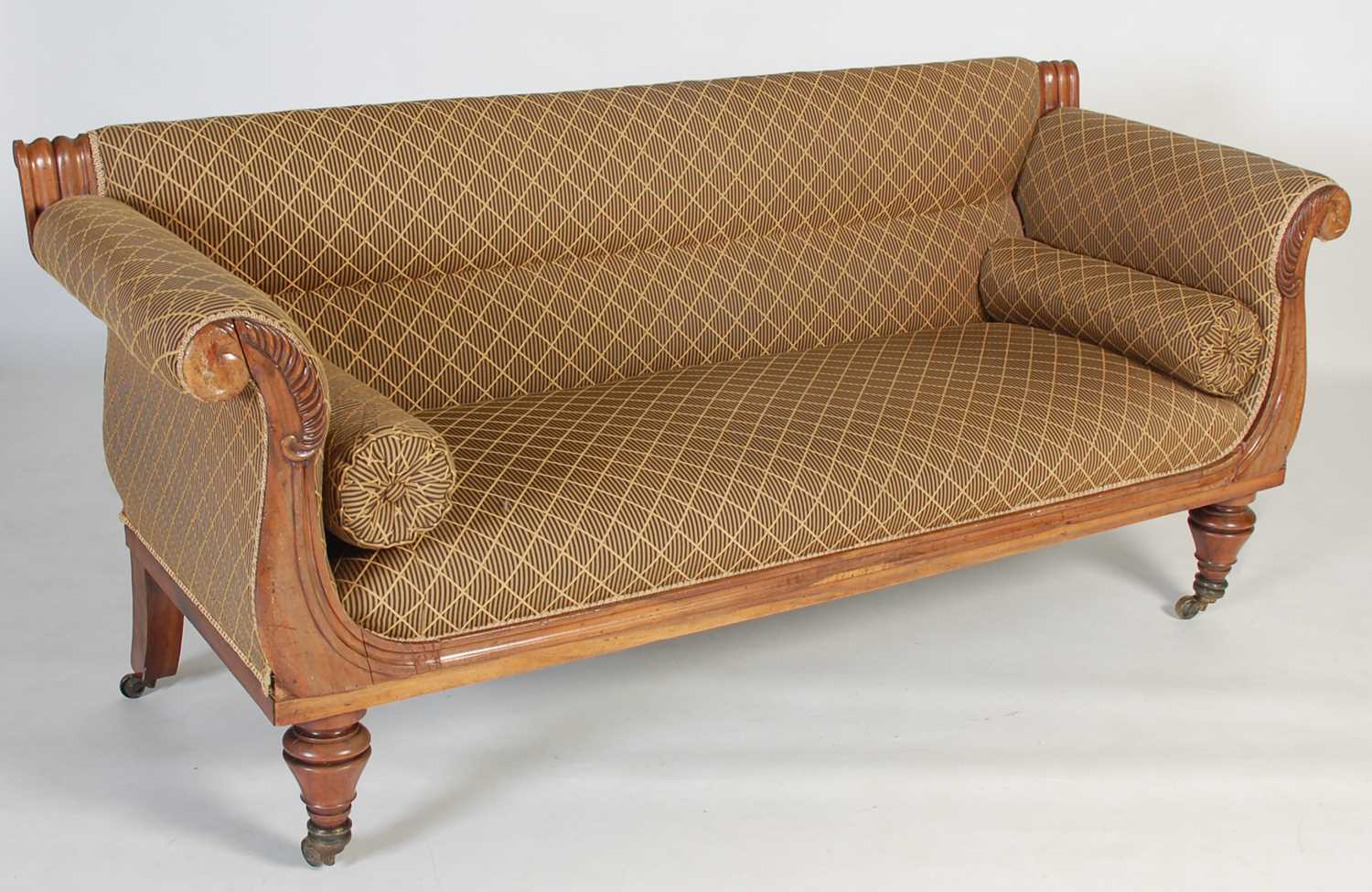 Lot 31 - An early 19th century Goncalo Alves sofa, the...