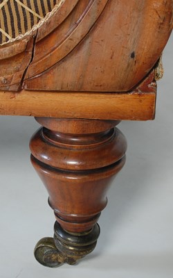 Lot 31 - An early 19th century Goncalo Alves sofa, the...