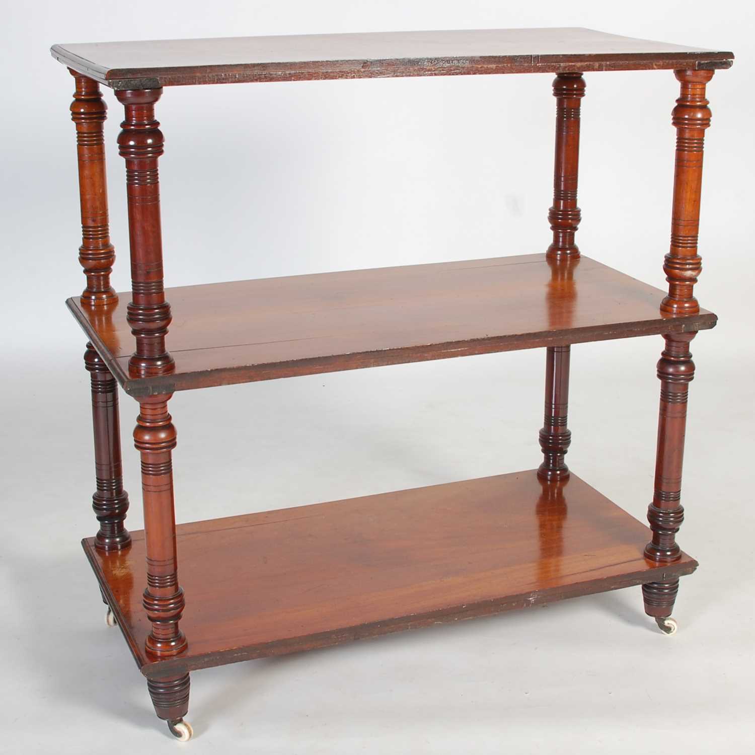 Lot 83 - A 19th century mahogany three tier whatnot,...