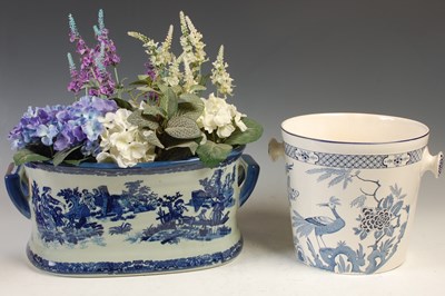 Lot 787 - A decorative blue and white ceramic twin...
