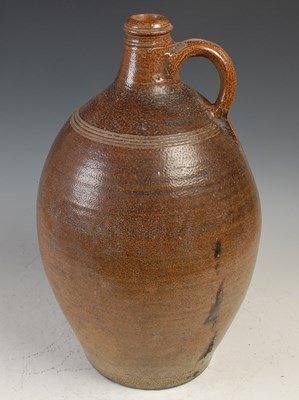 Lot 802 - A large Continental stoneware flagon, 19th...