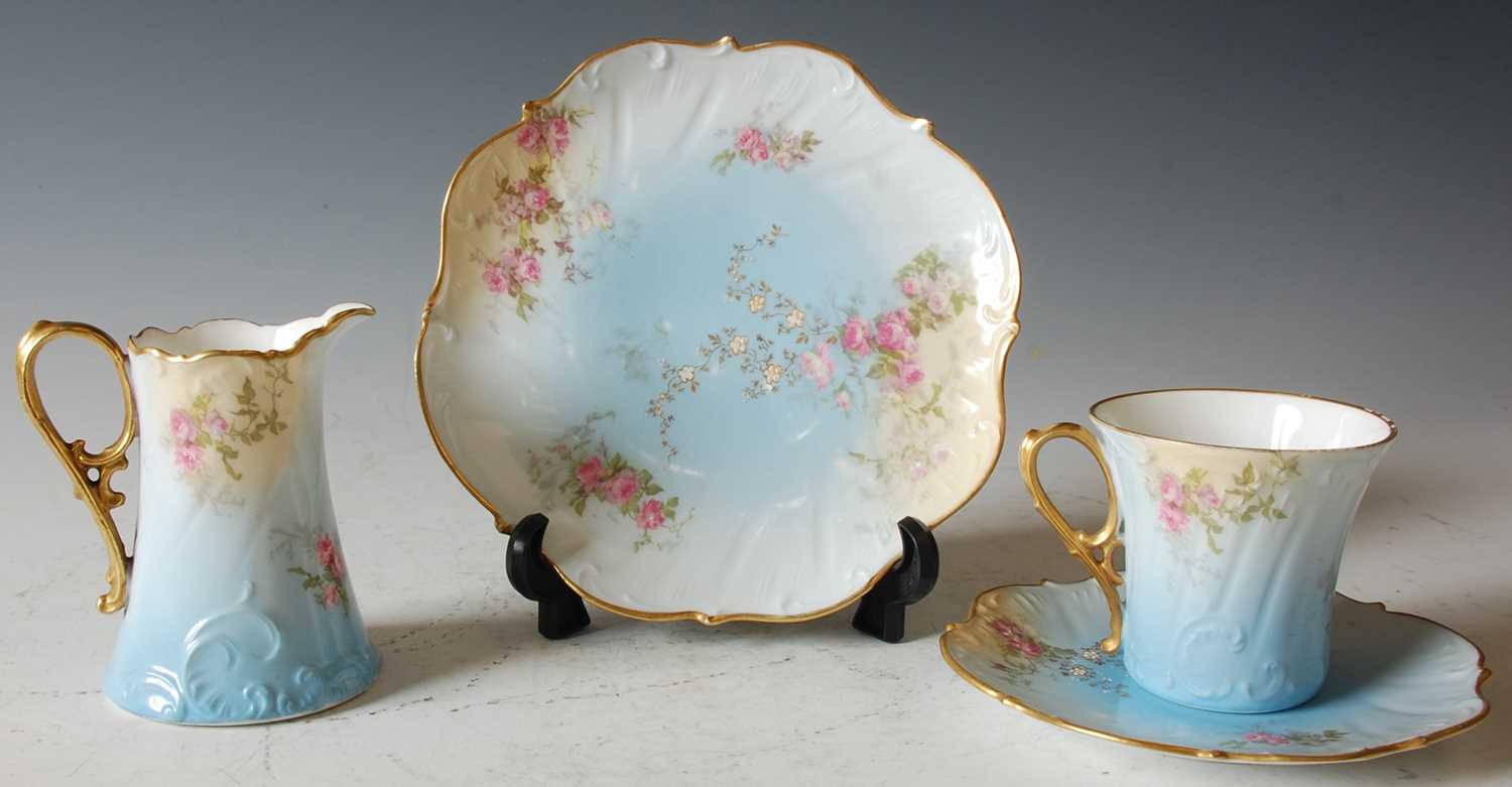 Lot 805 - A Limoges blue ground part tea set.