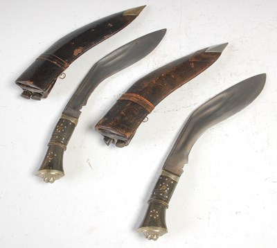 Lot 224 - Two similar Kukri knives, 35cm long.