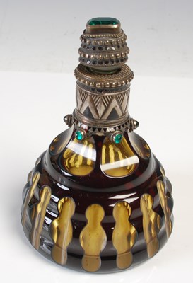 Lot 719 - A Continental white metal mounted amber...