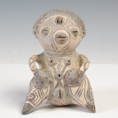 Lot 240 - A South American pottery fertility figure,...