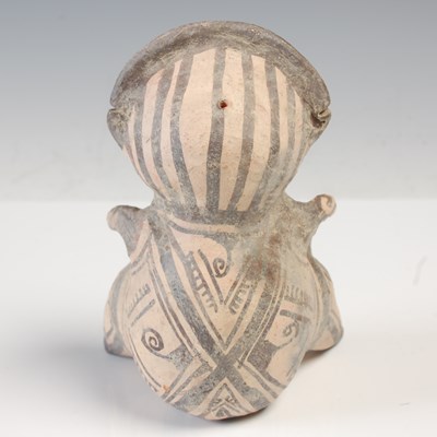 Lot 240 - A South American pottery fertility figure,...