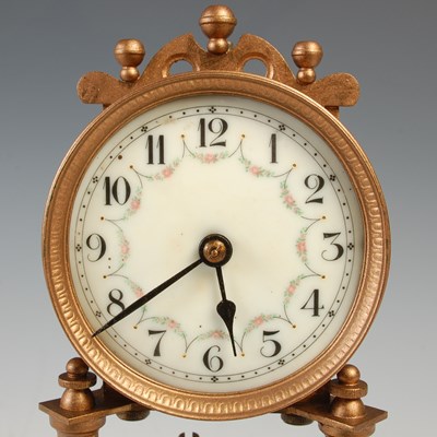 Lot 288 - A vintage mantle clock under glass dome, the...