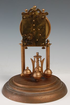 Lot 288 - A vintage mantle clock under glass dome, the...
