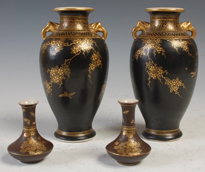 Lot 840 - A pair of Japanese Satsuma pottery black...