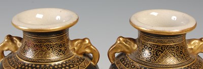 Lot 840 - A pair of Japanese Satsuma pottery black...