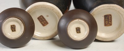 Lot 840 - A pair of Japanese Satsuma pottery black...
