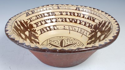 Lot 752 - A Seaton Pottery marriage bowl dated 1893,...