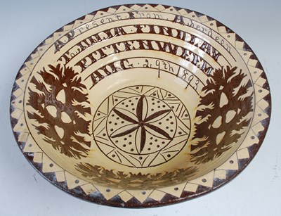 Lot 752 - A Seaton Pottery marriage bowl dated 1893,...