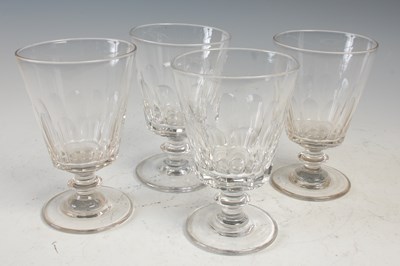 Lot 709 - A set of four 19th century clear glass rummers,...