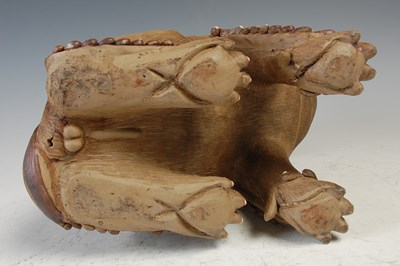 Lot 811 - A Chinese ceramic Shiwan type model of a Foo...