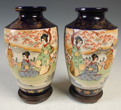 Lot 849 - A pair of Japanese Satsuma pottery blue ground...