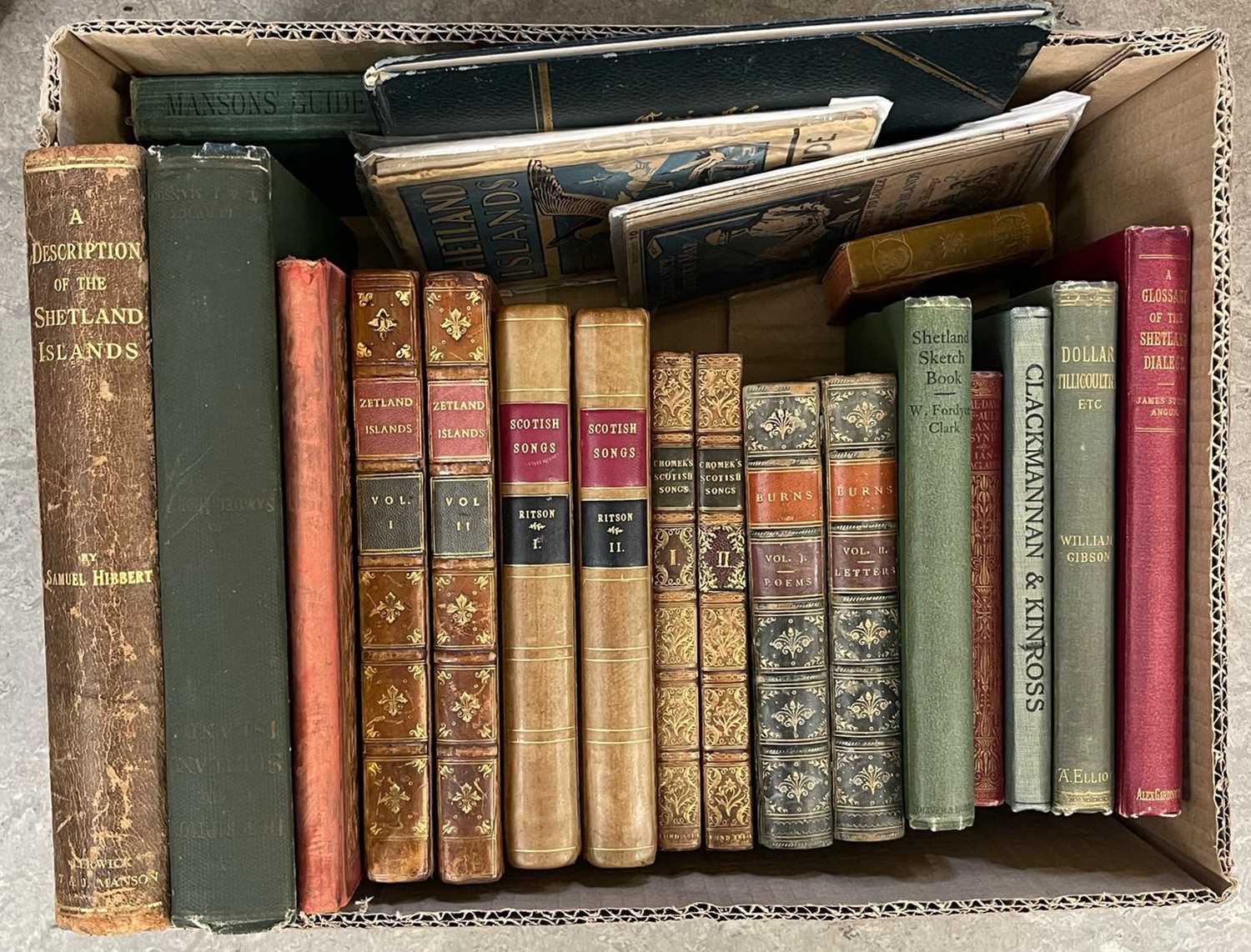Lot 334 - A box of assorted antique books, to include...