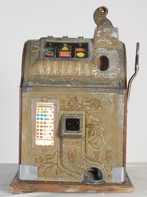 Lot 184 - A vintage American One-Arm Bandit slot machine,...